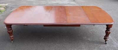 Lot 1407 - A Victorian mahogany extending dining table,...