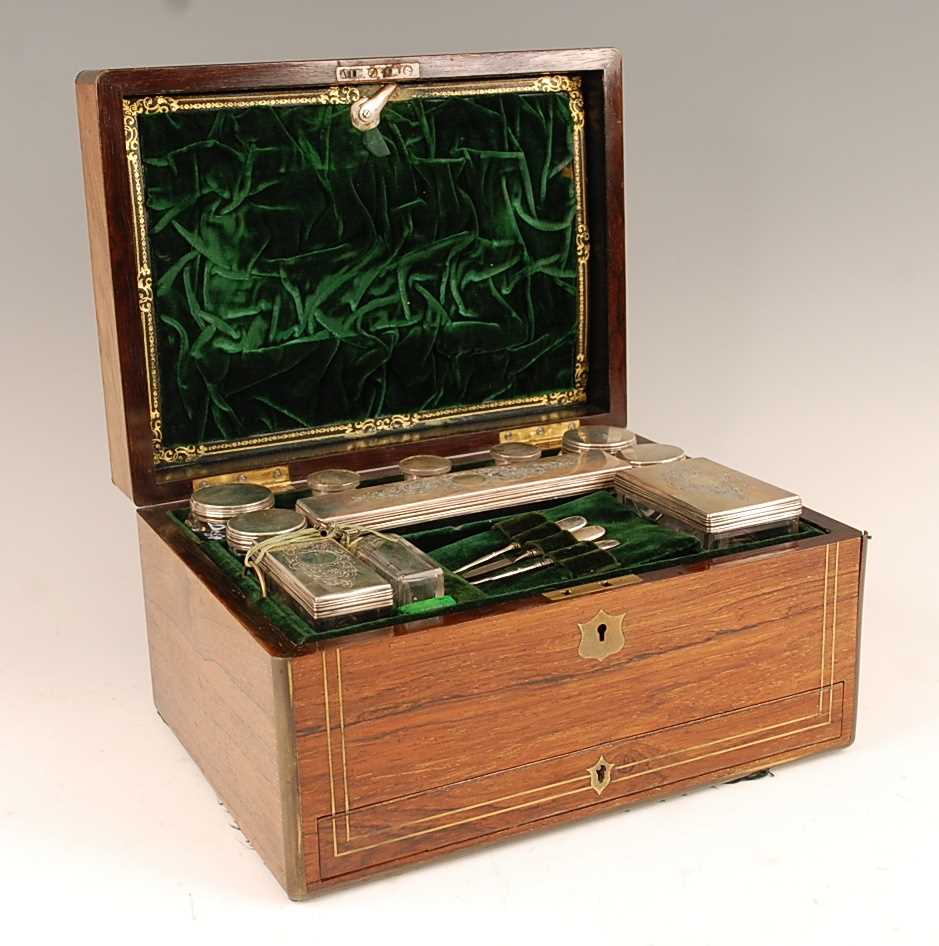 Lot 3081 - A Victorian rosewood and brass bound fitted...