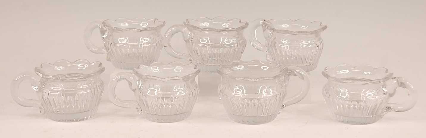 Lot 3047 - A set of seven William IV cut glass custard...