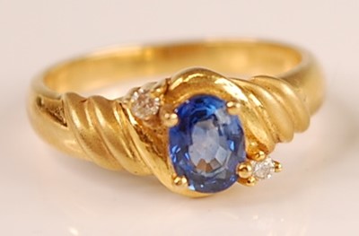Lot 3092 - An 18ct gold Ceylon sapphire and diamond set...
