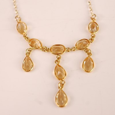 Lot 3118 - A contemporary 9ct gold citrine set...