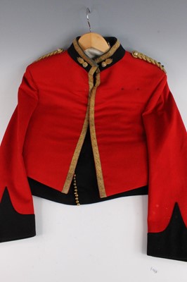 Lot 2469 - An Officer's mess jacket having gold braid...
