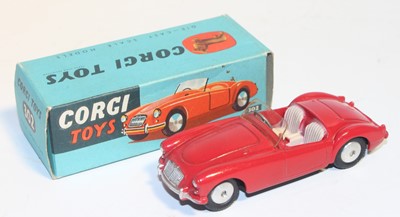 Lot 1015 - Corgi Toys 302, M.G.A sports car in red, mint...