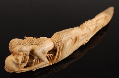 Lot 51 - * A cow bone? model of a tusk, carved as a...