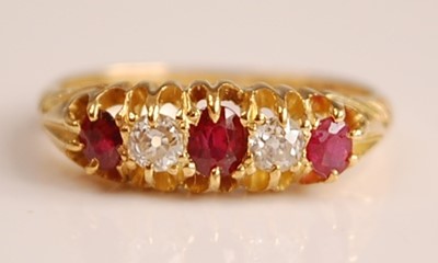 Lot 1091 - An Edwardian 18ct yellow gold, ruby and...