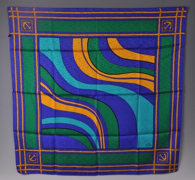 Lot 183 - A Rolex Oyster silk scarf, bright colour...