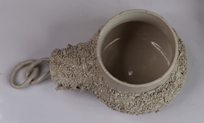 Lot 1013 - A George III salt-glazed white stoneware 'Bear-...