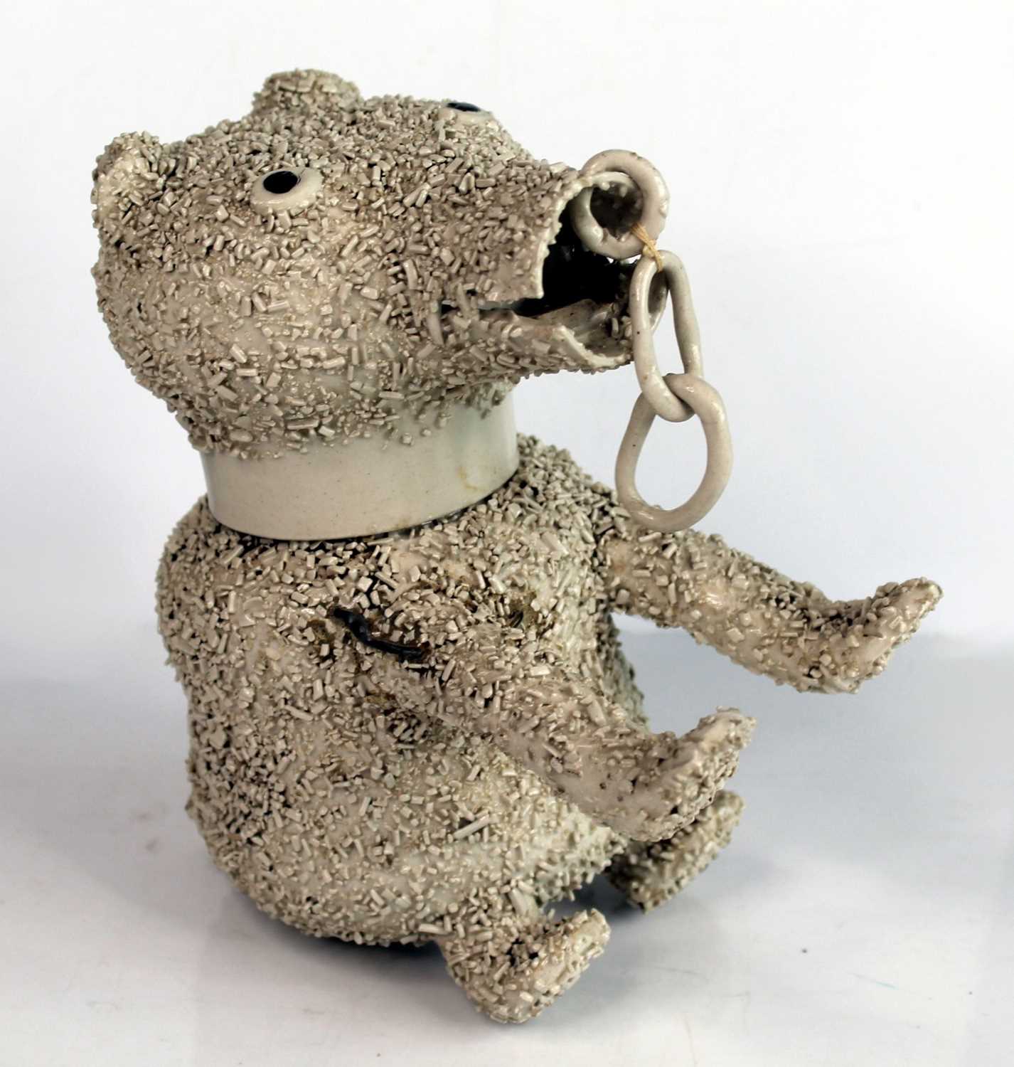 Lot 1013 - A George III salt-glazed white stoneware 'Bear-...