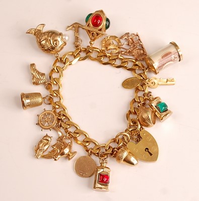 Lot 1089 - A 9ct yellow gold curblink bracelet, with...