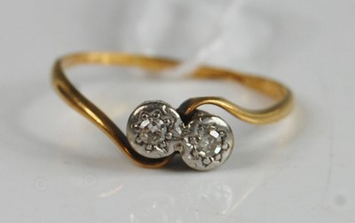 Lot 352 - A yellow and white metal, diamond two-stone...