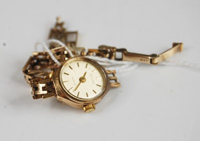 Lot 355 - A yellow metal Accurist quartz watch, having...