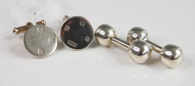 Lot 360 - Two pairs of silver cufflinks - one pair...