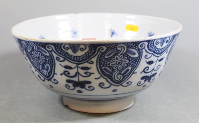Lot 100 - A 17th century English Delft bowl, the...