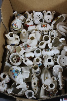 Lot 116 - A collection of assorted crested cabinet china...