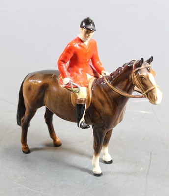 Lot 244 - A Beswick figure of The Huntsman, in standing...