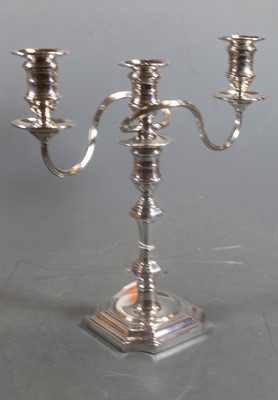 Lot 306 - A silver plate on cooper three-sconce table...