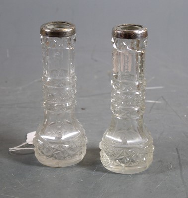 Lot 307 - A pair of 20th century cut glass spill vases,...
