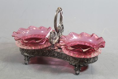 Lot 308 - A late Victorian silver plated sweetmeat cruet,...