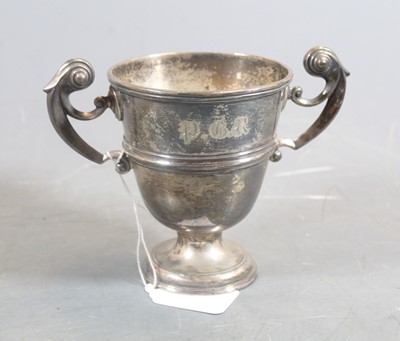 Lot 314 - An Edwardian silver twin handled trophy cup,...