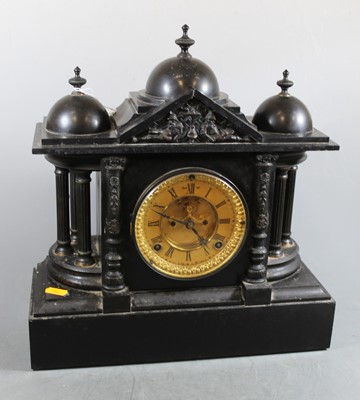 Lot 184 - A late Victorian black slate mantel clock of...