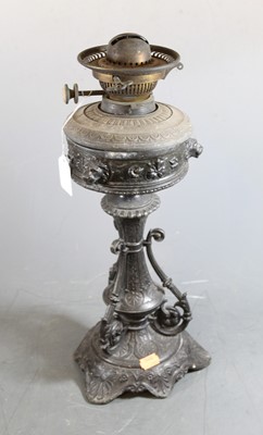 Lot 190 - A late Victorian cast metal pedestal oil lamp,...