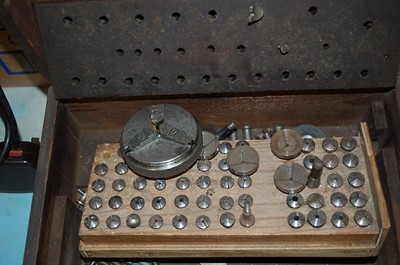 Lot 488 - A box of assorted fittings for watchmakers lathes
