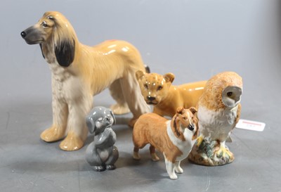 Lot 282 - A Beswick model of a lion cub facing left,...