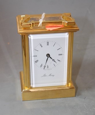 Lot 442 - A lacquered brass cased carriage clock, the...