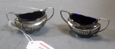 Lot 445 - A pair of George V silver twin handled open...