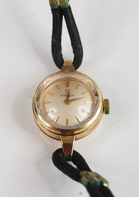Lot 386 - An Omega 9ct gold cased lady's wristwatch,...