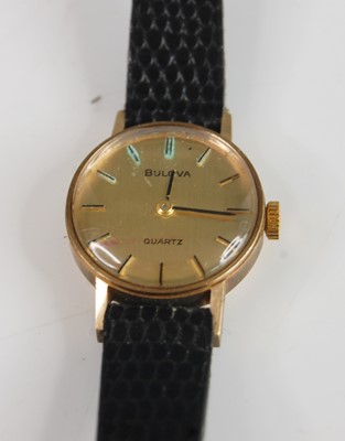 Lot 387 - A Bulova lady's 9ct gold cased quartz...