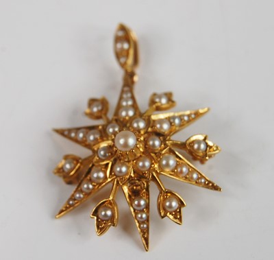 Lot 395 - An Edwardian yellow metal and seed pearl set...