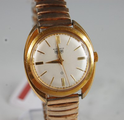 Lot 403 - A gent's Heuer gold plated and steel backed...