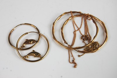 Lot 407 - A pair of yellow metal dolphin inset hoop...