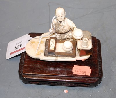 Lot 448 - A Japanese Meiji period (1868-1912) okimono,...