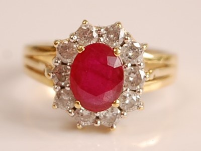 Lot 1093 - A yellow and white metal, ruby and diamond...