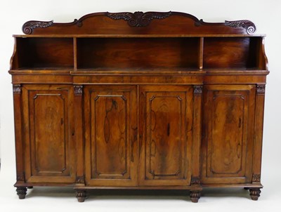 Lot 1355 - A Regency rosewood breakfront four-door...