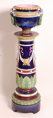 Lot 1014 - A Victorian majolica pedestal jardiniere in...