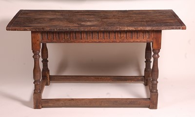 Lot 1380 - An 18th century joined oak refectory table, of...