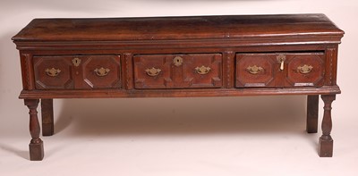 Lot 1399 - An early 18th century oak dresser base, having...