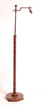 Lot 390 - An Art Deco 'Calamander' standard lamp, having...