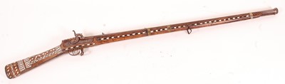 Lot 42 - A 19th century Afghan/Indian Jezail type rifle,...
