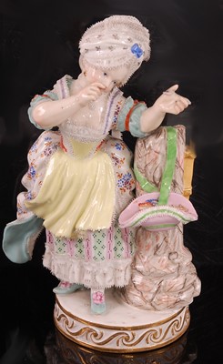 Lot 1015 - A 19th Century Meissen porcelain figurine of a...