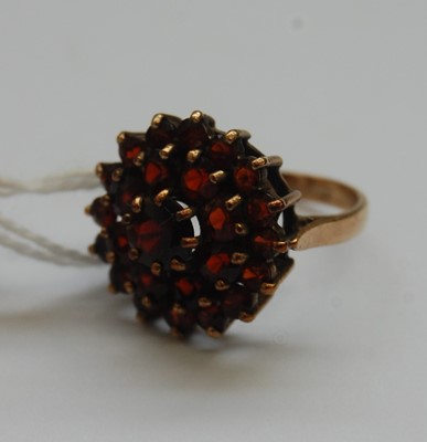 Lot 341 - A modern 9ct gold smoky quartz set dress ring,...
