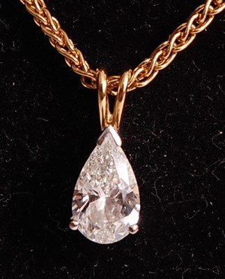 Lot 1107 - An 18ct yellow and white gold diamond single...
