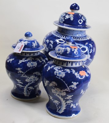 Lot 14 - A garniture of three Chinese blue and white...