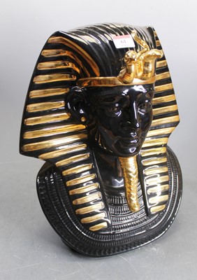 Lot 61 - A 20th century black glazed and gilt...