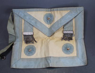 Lot 76 - A brown leather bag containing a collection of...