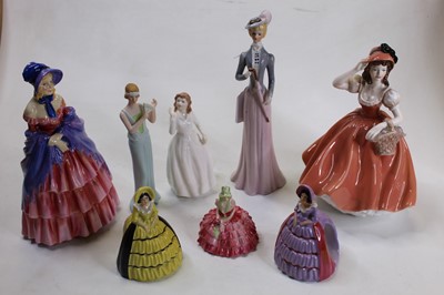 Lot 233 - A Coalport porcelain lady's fashion figure of...
