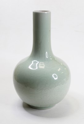 Lot 251 - A Chinese export celadon glazed bottle vase,...